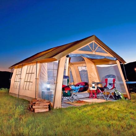 This Giant House Shaped Tent With a Front Porch Fits Up To 10 People, Has 200 Square Feet of Space