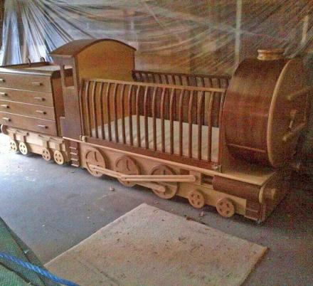 This Handmade Wooden Train Crib Pulls Behind a Dresser Train Car