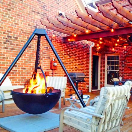 This Hanging Tripod Fire Pit Might Be The Manliest Way To BBQ Or Have a Bonfire