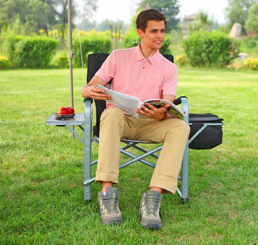 This Folding Lawn Chair Has A Cooler And A Side Table Attached To It