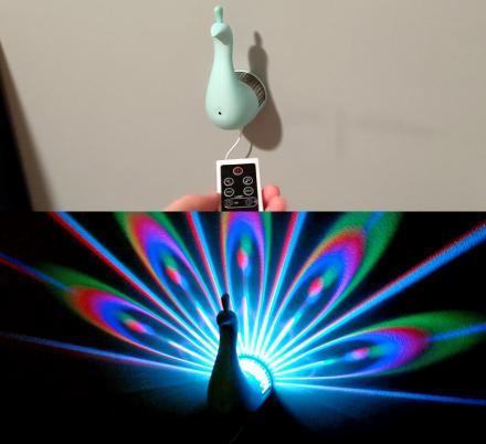 This LED Peacock Night-Light Projects Its Colorful Plumage Onto Your Wall