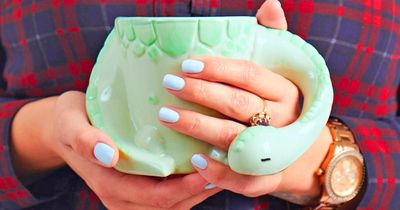 This Sleeping Dinosaur Mug Might Be The Cutest Way To Sip Your Morning Coffee