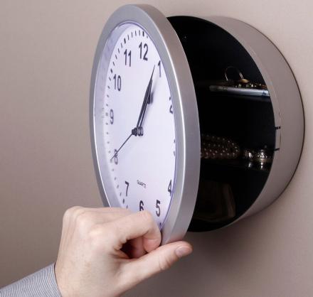 This Wall Clock Swings Open To Reveal a Secret Hidden Safe Inside