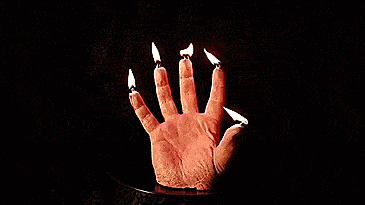 Creepy Hand Candle Bleeds as it Burns