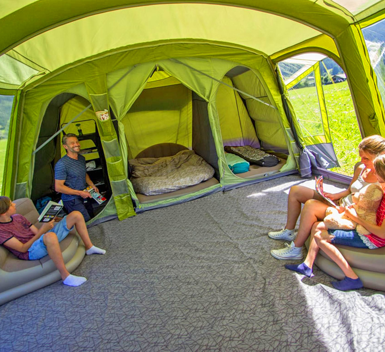giant family tent that has private bedroom compartments and a full living area