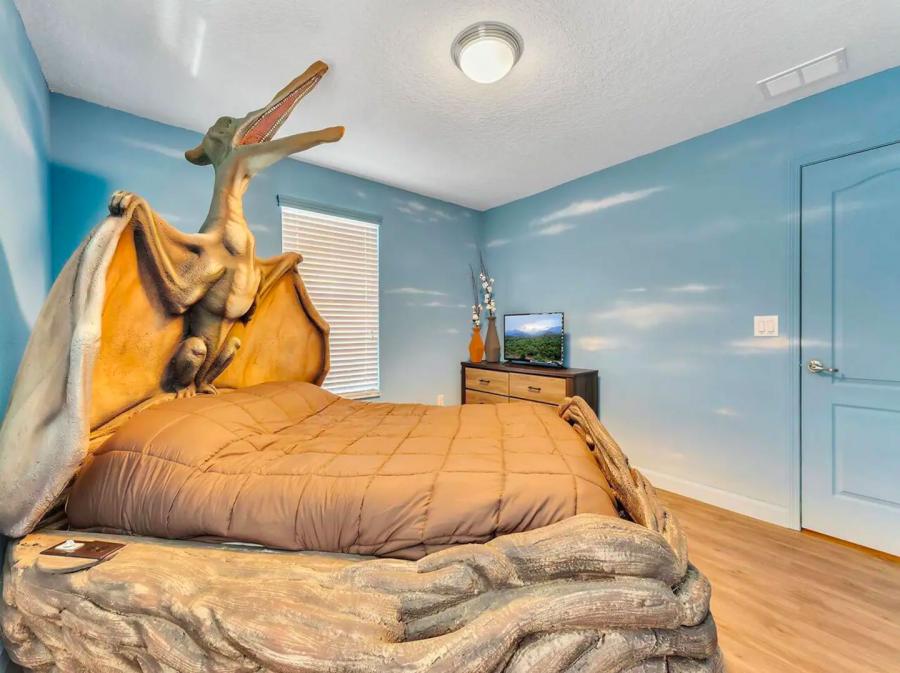 Dino-Themed Airbnb With Giant Dinosaur Beds - Dinosaur vacation rental home