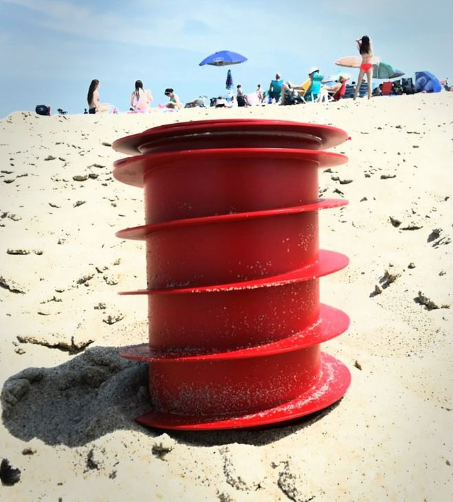 This Beach Vault Screws Into The Sand To Hide and Protect Your