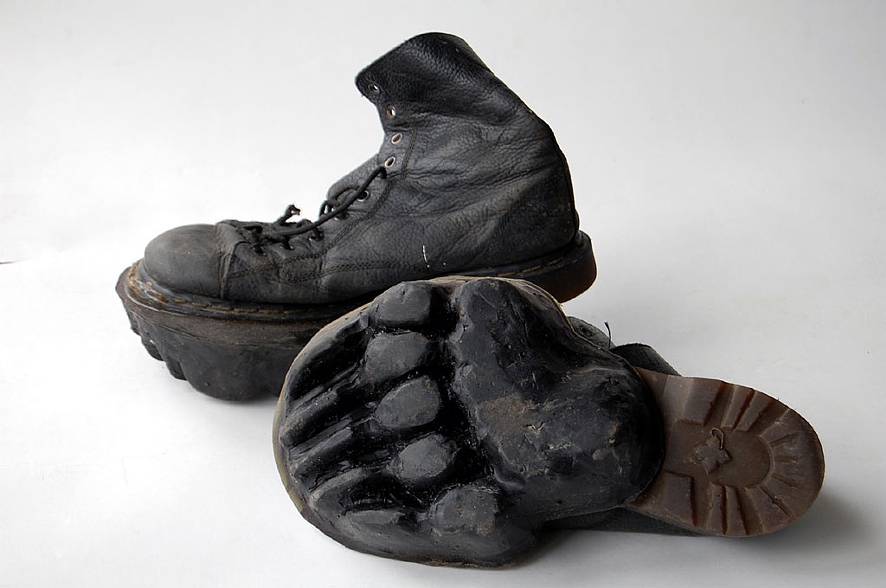 Animal footprint shoes leave behind deer and bear tracks in snow