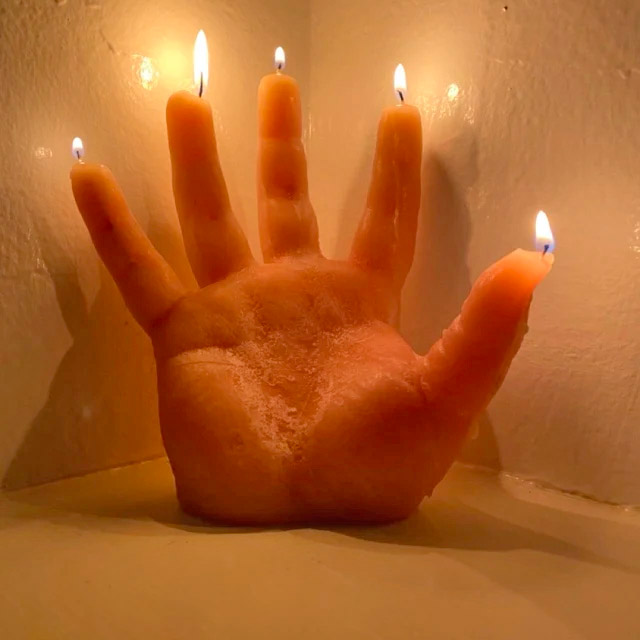 Hand candle deals