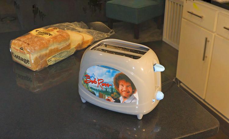 Bob Ross Toaster Toasts Bob Ross' Face Onto Toast