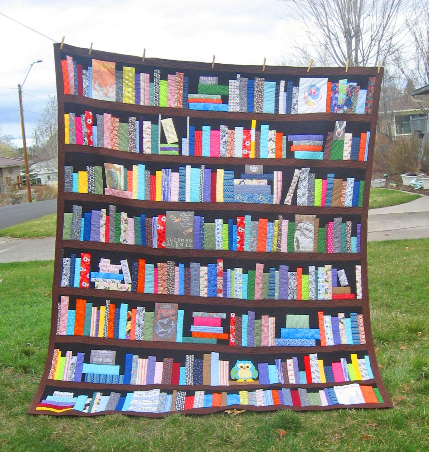 you-can-get-a-bookcase-quilt-customized-with-your-favorite-books-and-hobbies-on-the-shelves