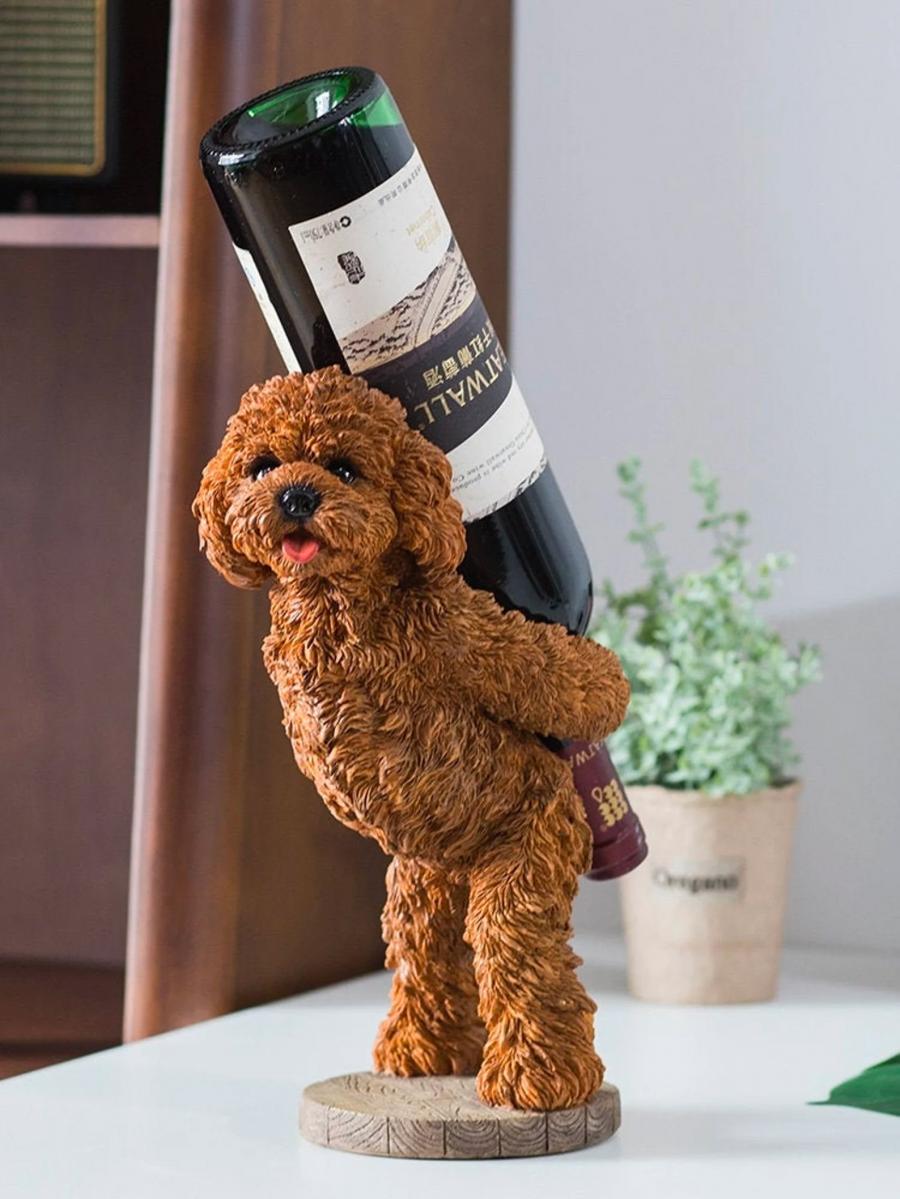 wine bottle holding dog