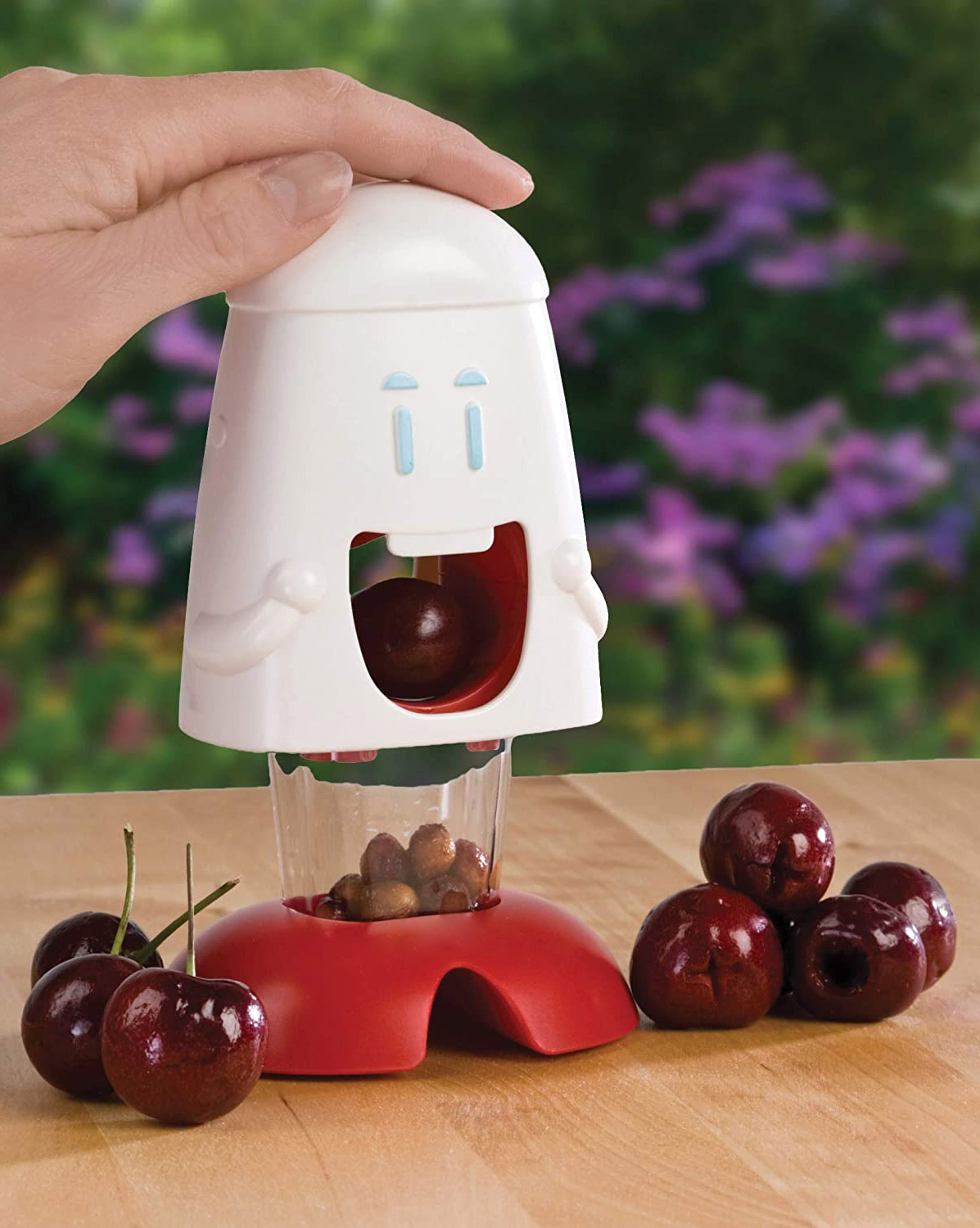 https://odditymall.com/includes/content/upload/cherry-chomper-cherry-pitter-2869.jpg