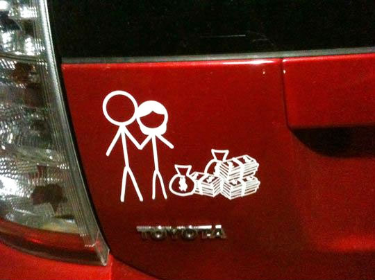No Kids Stick Figure Family With Bags of Cash