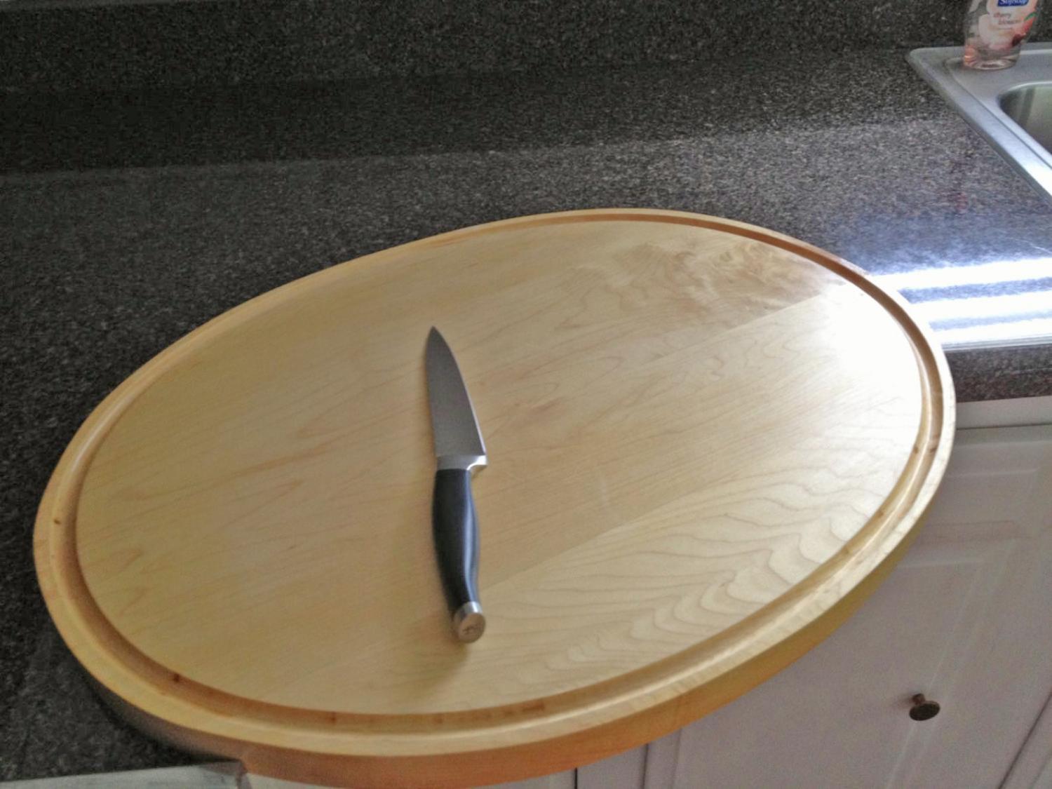 This Beautiful Wooden Corner Cutting Board Attaches Securely To