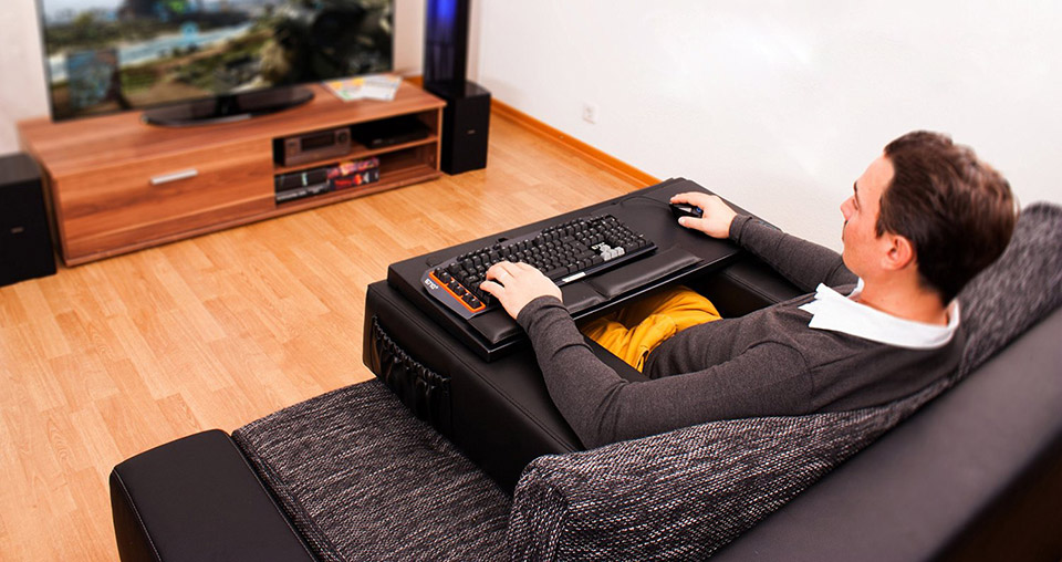 Couchmaster Is a Lap Desk That Creates a Workstation Right On Your Couch - Couch desk with cushion armrests
