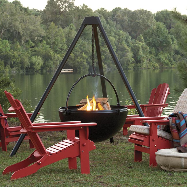 This Hanging Tripod Fire Pit Might Be The Manliest Way To BBQ Or