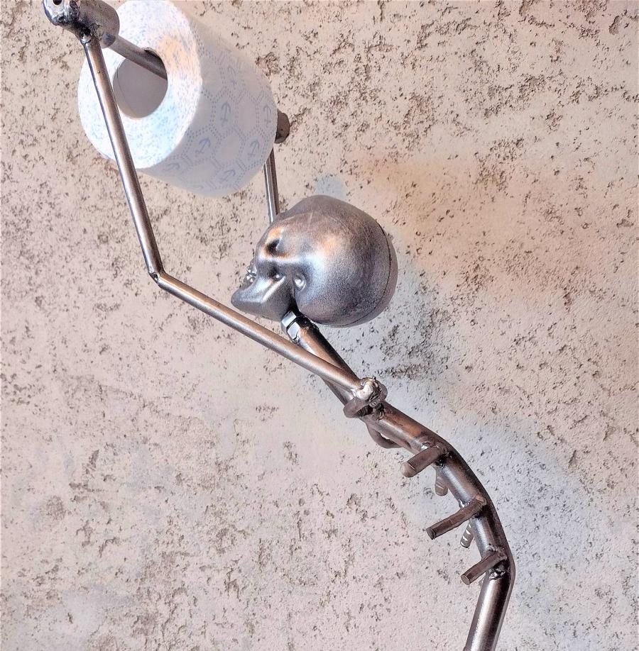 Creepy Metal Skeleton Toilet Paper Holder - your butt napkins my lord