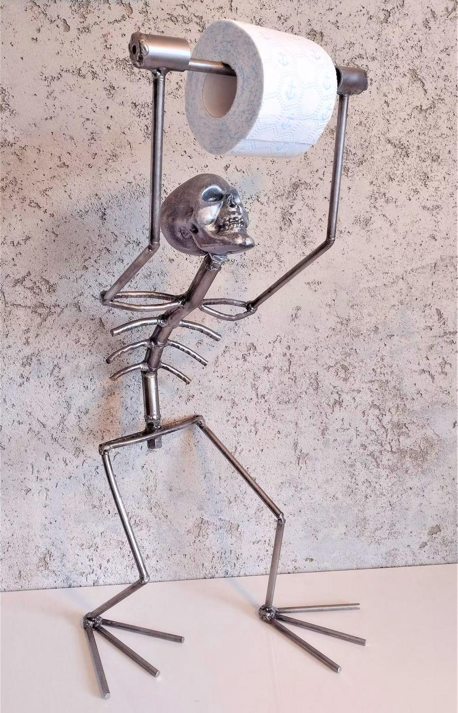Creepy Metal Skeleton Toilet Paper Holder - your butt napkins my lord