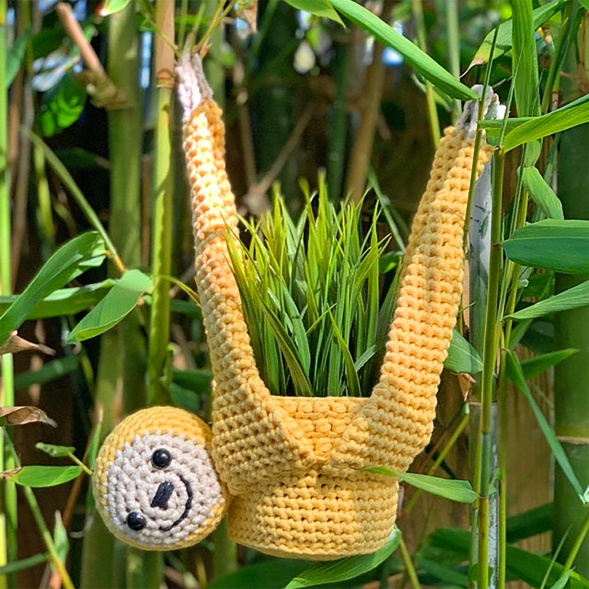 This Crochet Hanging Sloth Plant Holder Is Perfect For Lazy Plant Owners