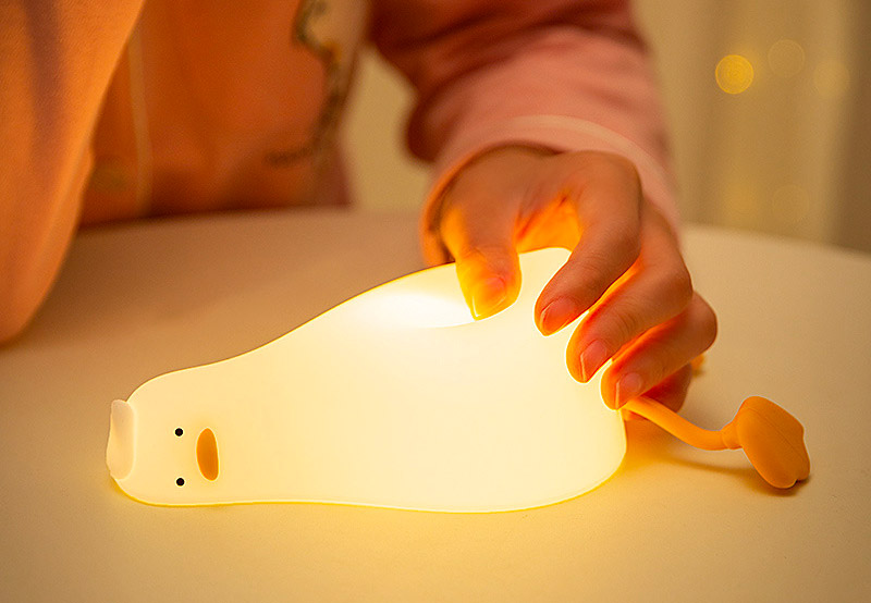 Funny defeated duck lying on stomach night-light - duck in existential crisis lamp