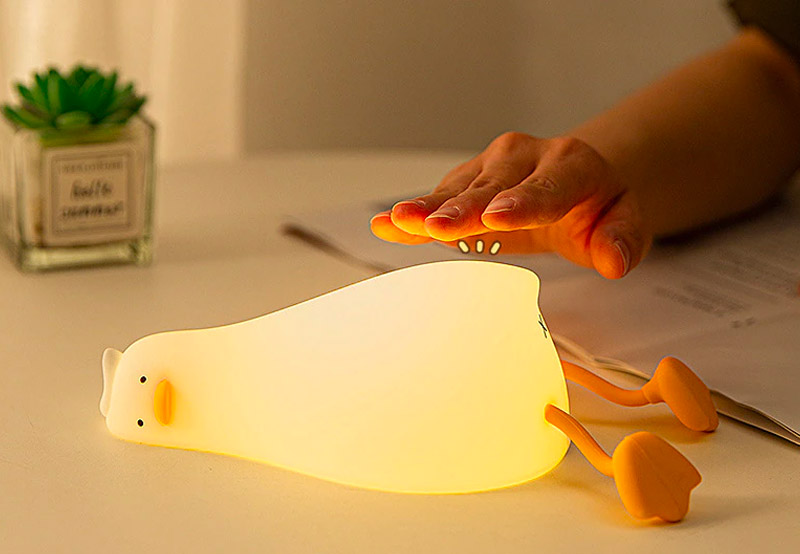 Funny defeated duck lying on stomach night-light - duck in existential crisis lamp