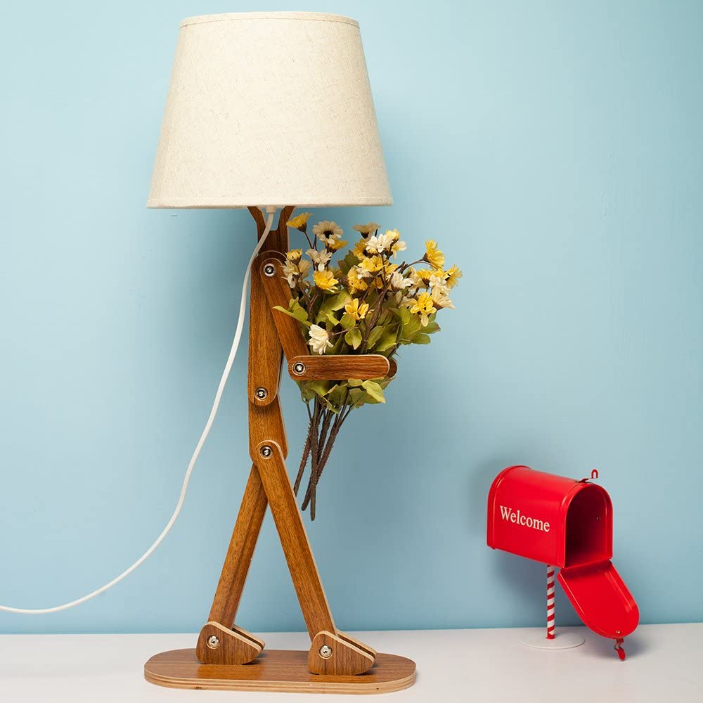 this-sad-man-adjustable-wooden-lamp-is-how-we-all-currently-feel