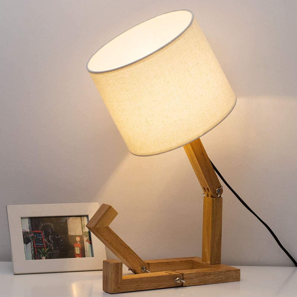 This Sad Man Adjustable Wooden Lamp Is How We All Currently Feel About 2020