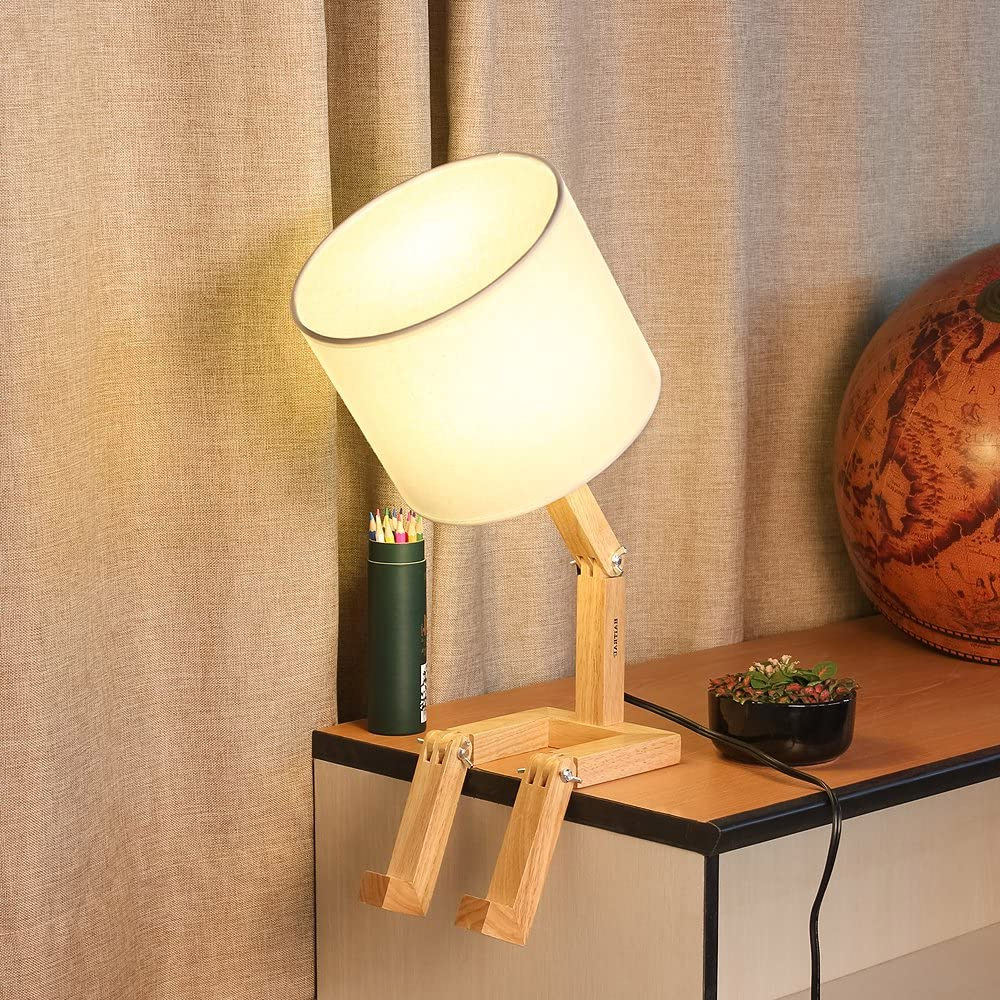 This Sad Man Adjustable Wooden Lamp Is How We All Currently Feel About 2020