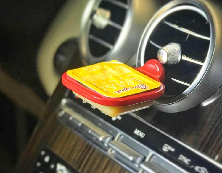 https://odditymall.com/includes/content/upload/dipclip-car-vent-sauce-holder-233.jpg