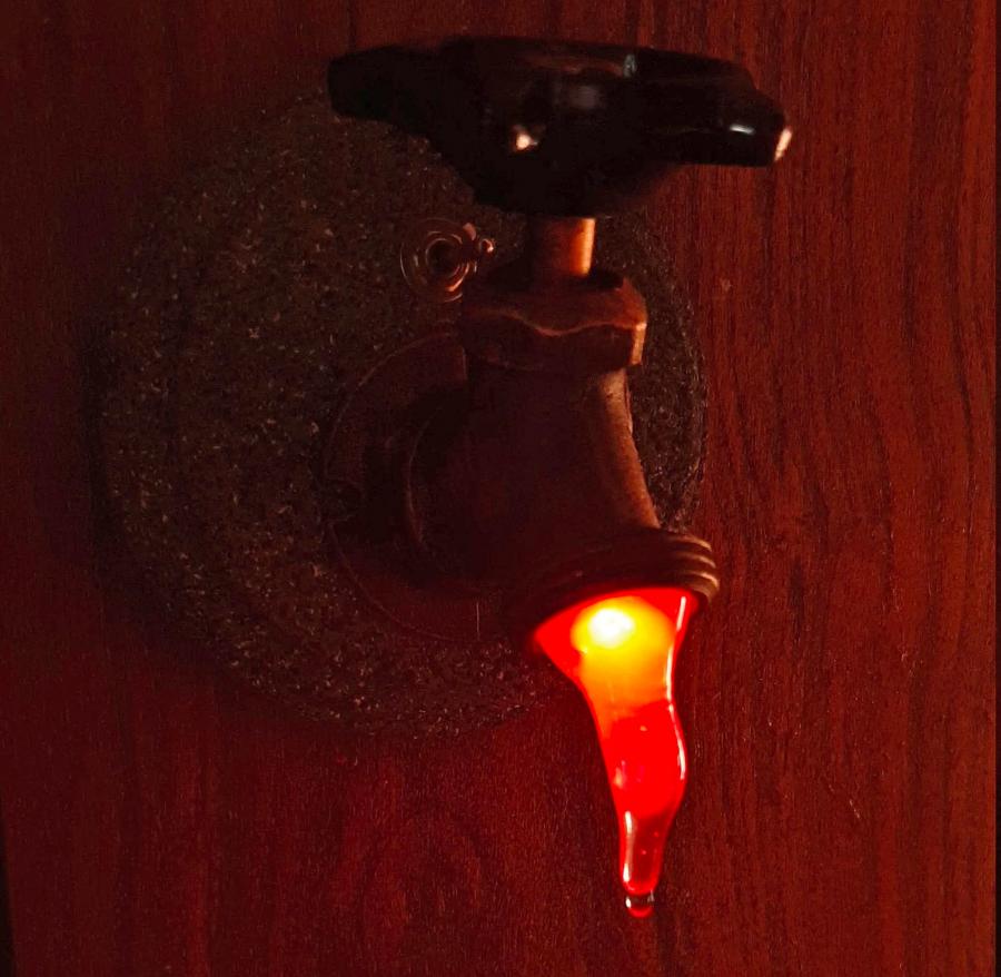 This Dripping Faucet Spigot Night Light Makes It Look Like It's