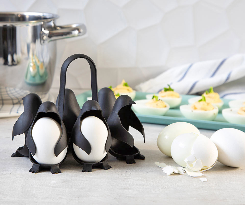 https://odditymall.com/includes/content/upload/egguins-are-little-penguins-that-cook-store-and-serve-hard-boiled-eggs-8861.jpg