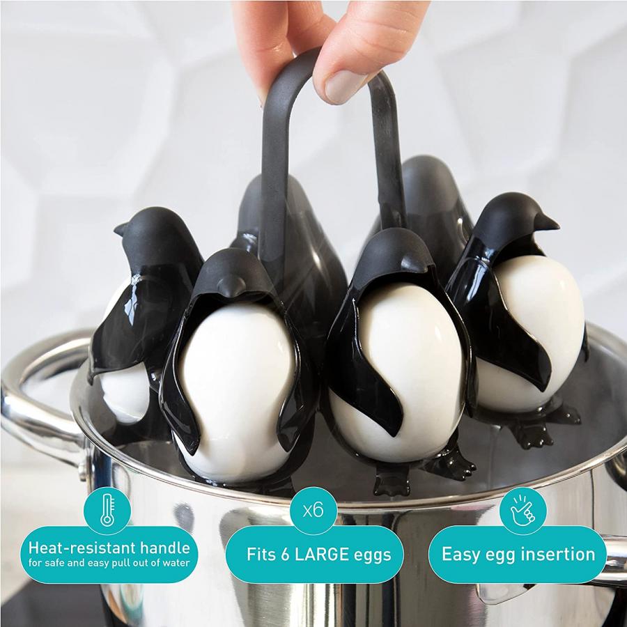 Egguins Penguin egg holders hold eggs under boiling water - penguin shaped egg server