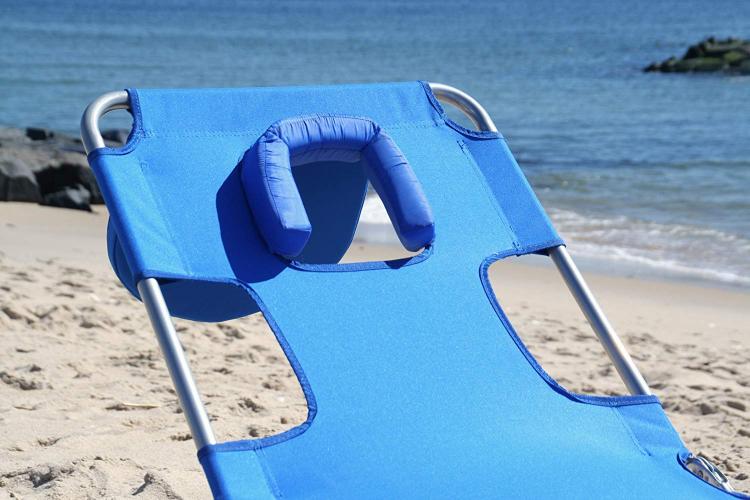 This Face Down Beach Lounge Chair Has Arm Holes and a Breast