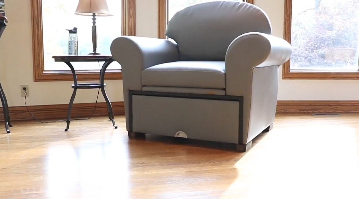 Stow-Away Fitness Equipment That Hides Inside Furniture When Not In Use - folding exercise bike inside armchair