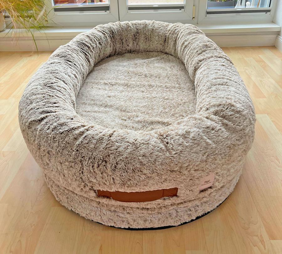 Human-size dog beds are a thing — seriously! — and you can get one on