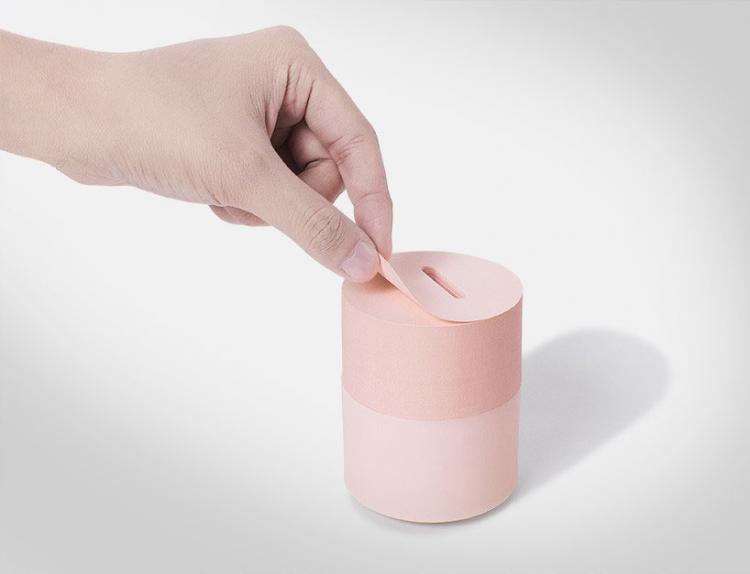 This Sticky Note Pad Doubles as a Piggy Bank