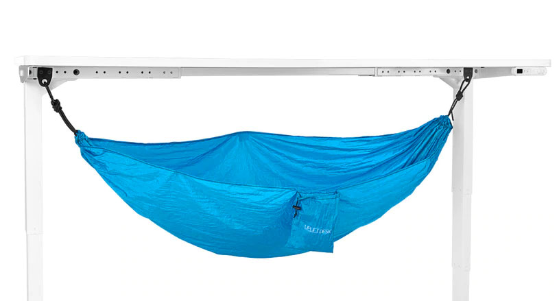 https://odditymall.com/includes/content/upload/get-your-nap-on-at-work-with-this-under-desk-hammock-6362.jpg