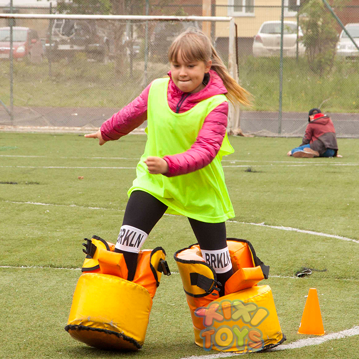 These Giant Inflatable Bouncy Shoes Will Make Giant Soccer Games Extra Fun