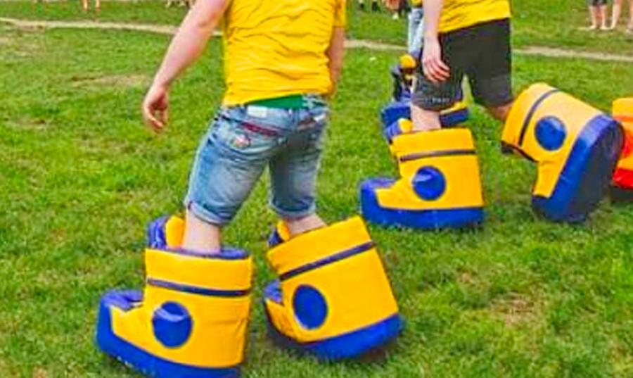 These Giant Inflatable Bouncy Shoes Will Make Giant Soccer Games Extra Fun