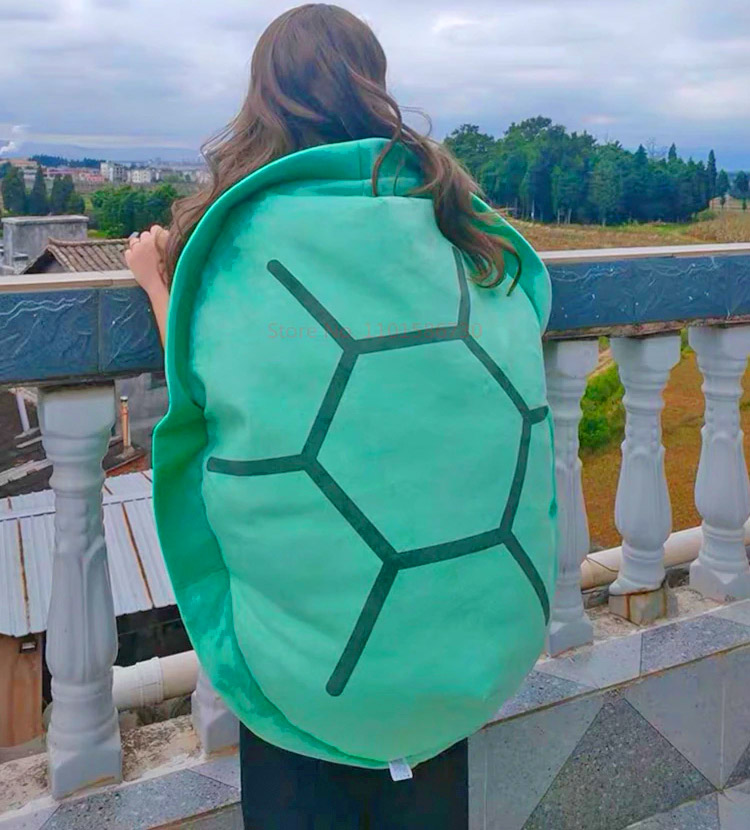 https://odditymall.com/includes/content/upload/giant-wearable-turtle-shell-pillow-4580.jpg