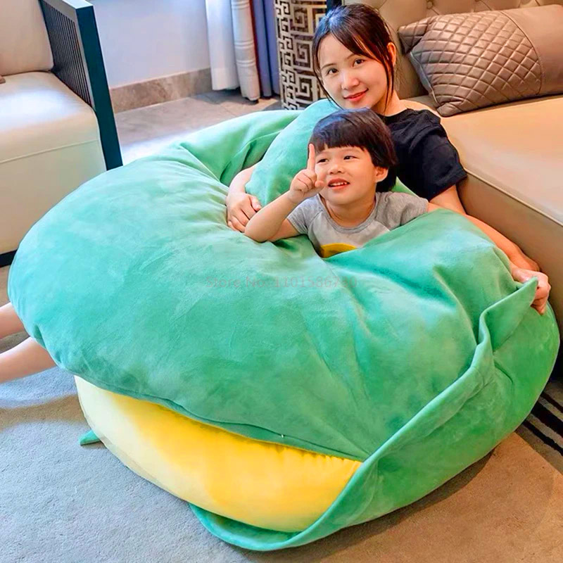 https://odditymall.com/includes/content/upload/giant-wearable-turtle-shell-pillow-5052.jpg