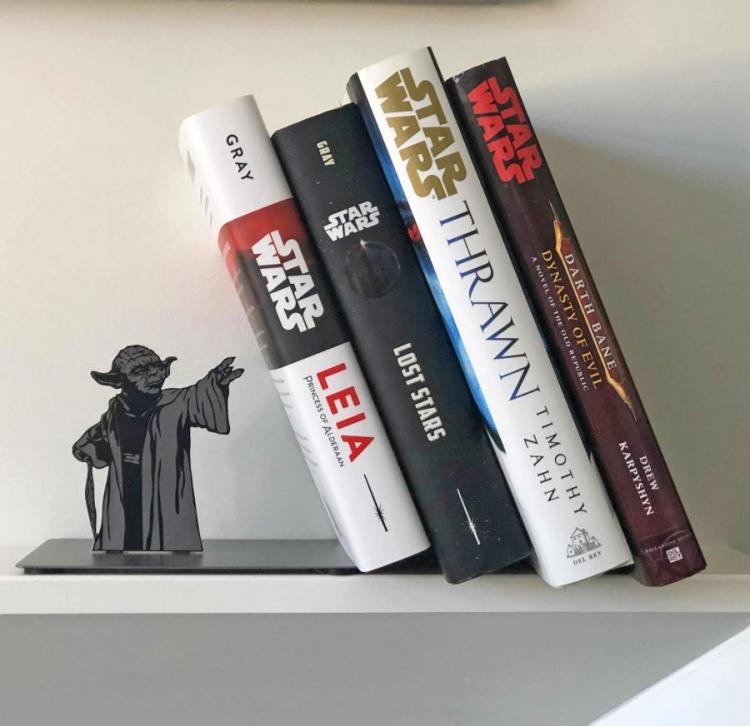 Yoda Bookend Holds Leaning Books Up With The Force
