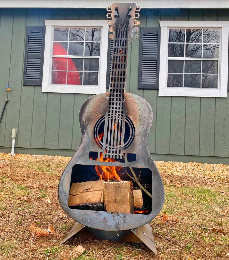 Guitar Fire Pit - Metal guitar shaped wood burning stove
