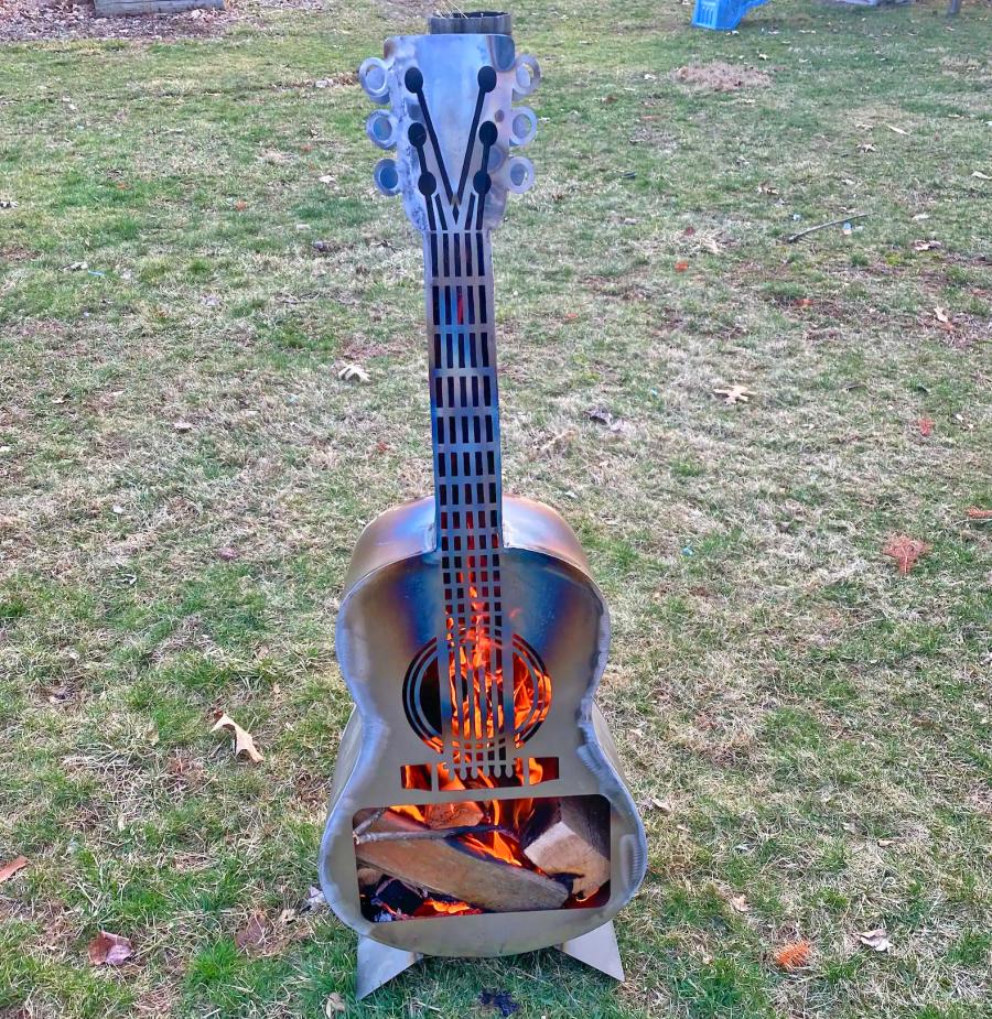 Guitar Fire Pit - Metal guitar shaped wood burning stove