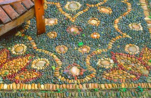 Outdoor rug mosaic made from pebbles and rocks