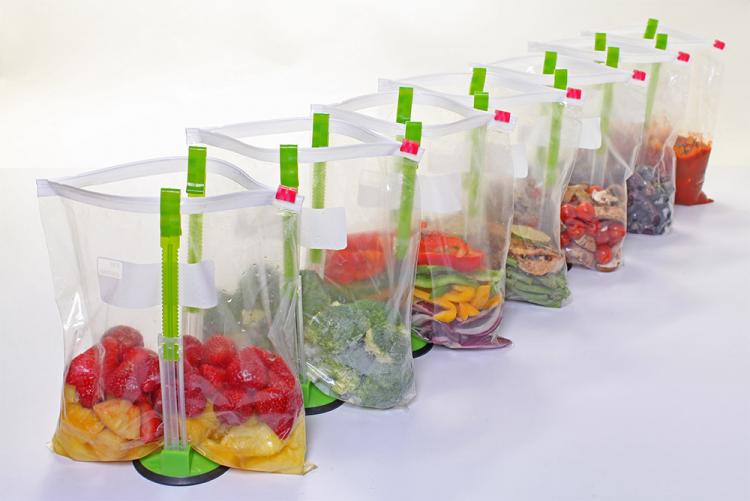 https://odditymall.com/includes/content/upload/hands-free-ziploc-bag-holder-3078.jpg