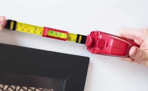 Hang-o-matic: All-in-one Picture Hanging Tool - Picture hanging tools built into tape measure