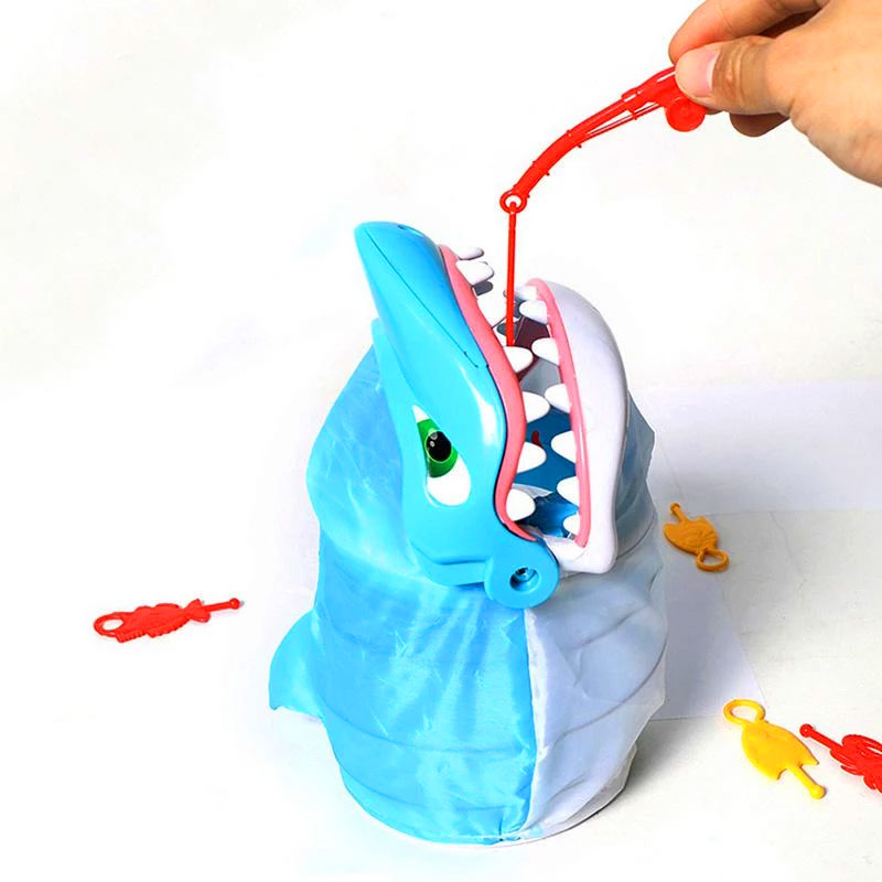 Have Fun While Teaching Fine Motor Skills With This Shark Bite Game