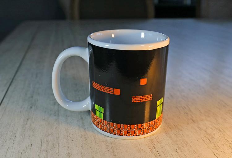 https://odditymall.com/includes/content/upload/heat-changing-mario-mug-213.jpg